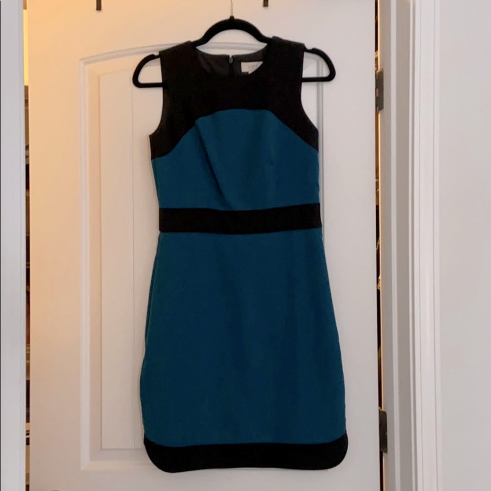 Blue and black formal work dress.
